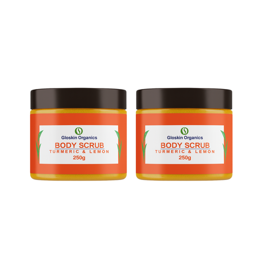 Gloskin Organics Turmeric & Lemon Body Scrub jar with fresh turmeric roots and lemon slices, handcrafted South African skincare